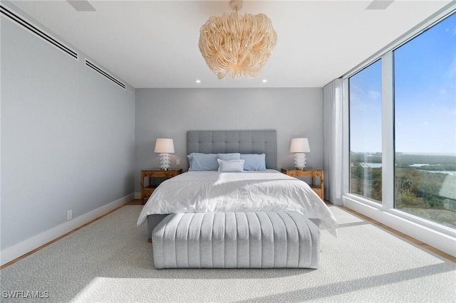 bedroom with expansive windows