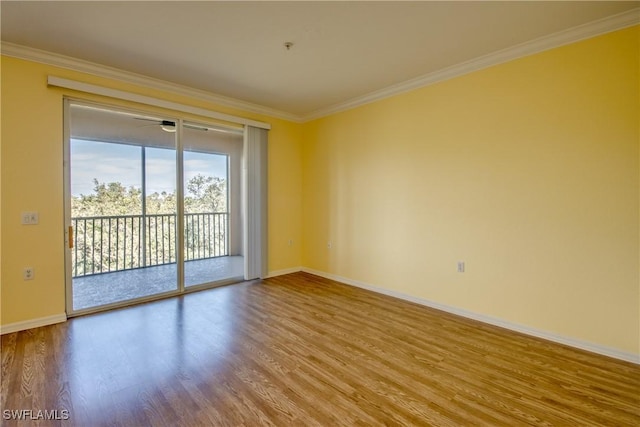 unfurnished room featuring crown molding, ceiling fan, and hardwood / wood-style floors