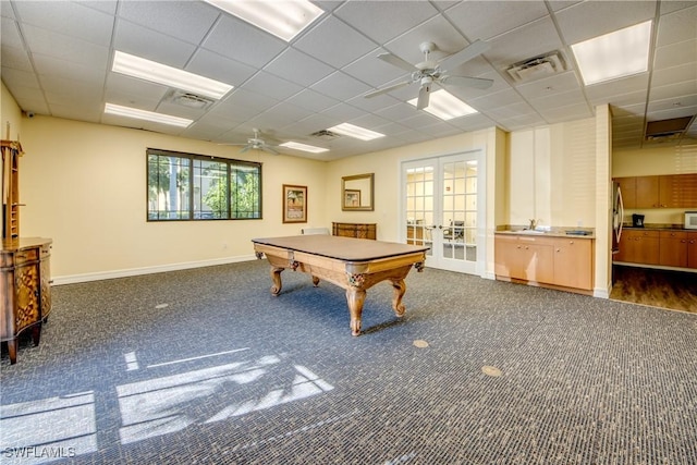 playroom with french doors, ceiling fan, billiards, and a drop ceiling