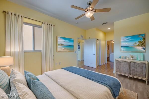 bedroom featuring ceiling fan and wood-type flooring