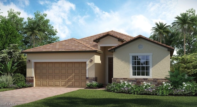 view of front of property featuring a garage and a front yard