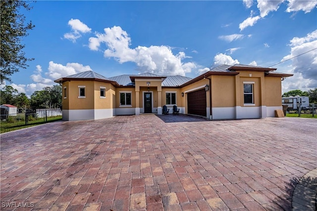 view of front of house with a garage