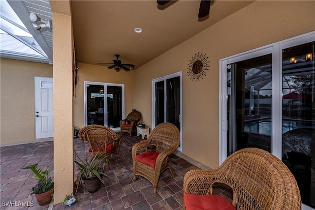 view of patio / terrace featuring ceiling fan