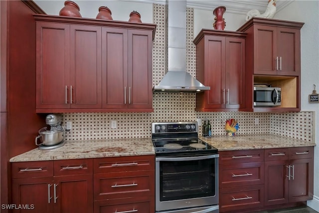 kitchen with wall chimney range hood, backsplash, stainless steel appliances, and light stone countertops