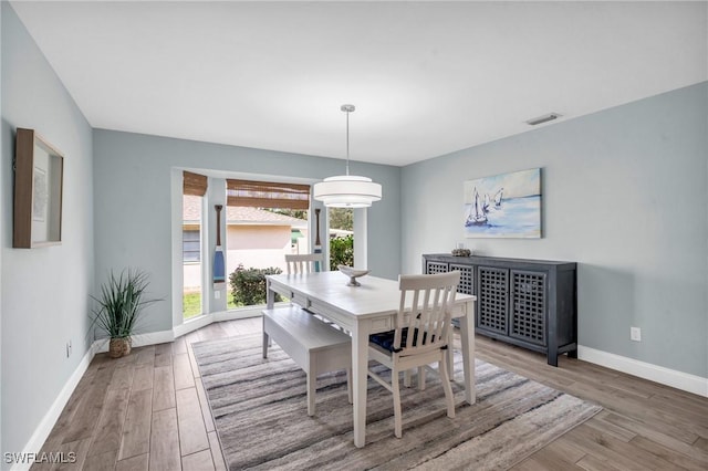 dining room featuring hardwood / wood-style floors