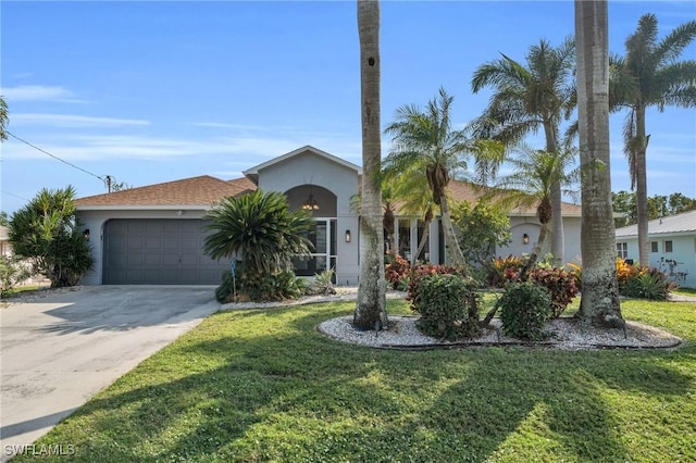 single story home with a garage and a front yard