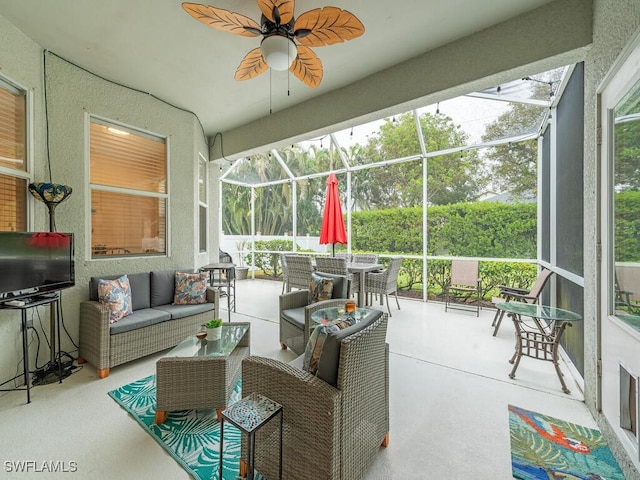 sunroom / solarium with ceiling fan