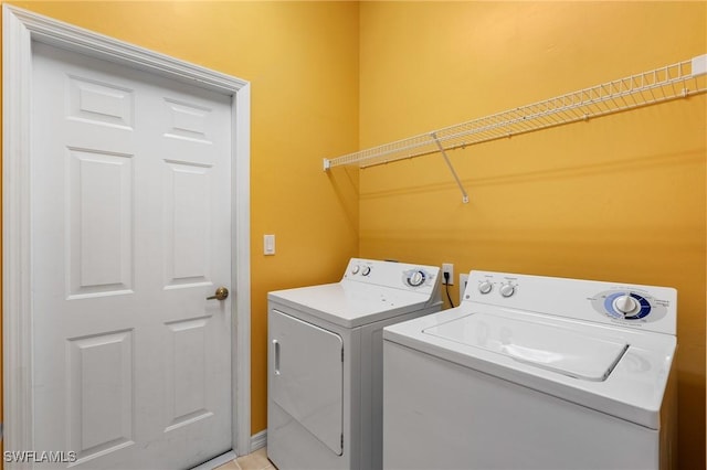 laundry area featuring washer and clothes dryer