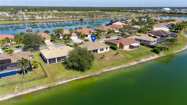 bird's eye view with a water view