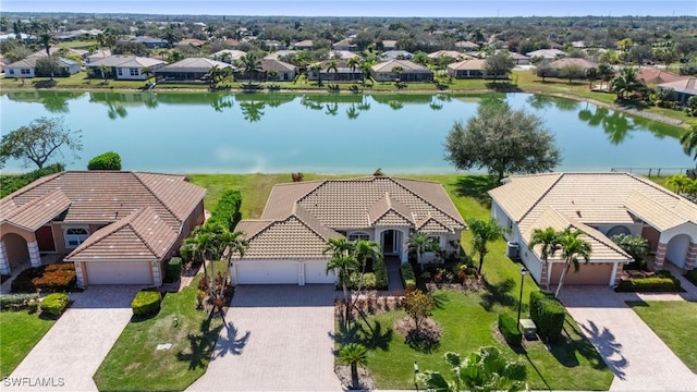 drone / aerial view with a water view