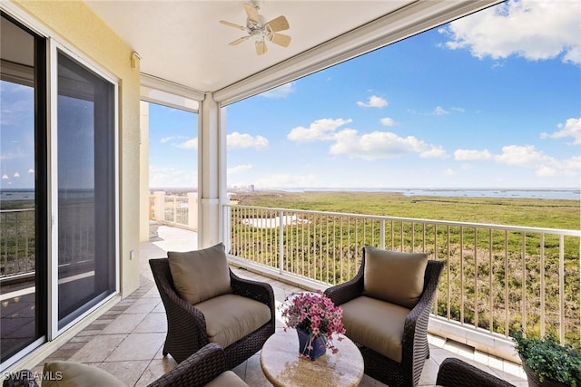 balcony featuring ceiling fan