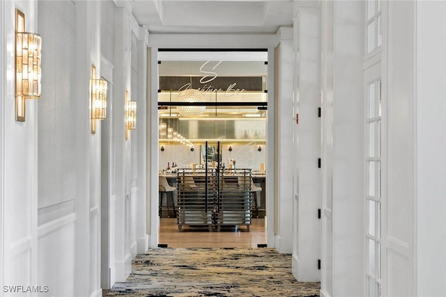 corridor featuring hardwood / wood-style floors