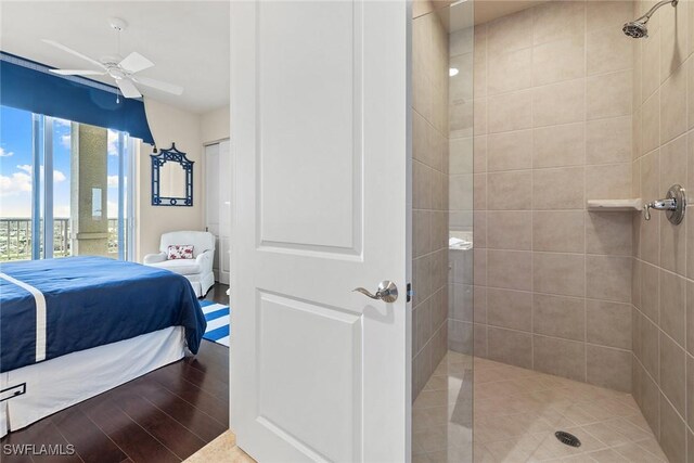 4751 W Bay Blvd Unit 2002, Estero, FL 33928 - interior space featuring ceiling fan, tiled shower, wood finished floors, and ensuite bathroom