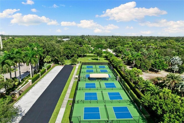 4751 W Bay Blvd Unit 2002, Estero, FL 33928 - birds eye view of property featuring a view of trees