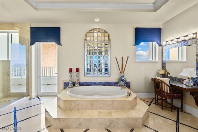 4751 W Bay Blvd Unit 2002, Estero, FL 33928 - bathroom with a garden tub, crown molding, baseboards, and plenty of natural light