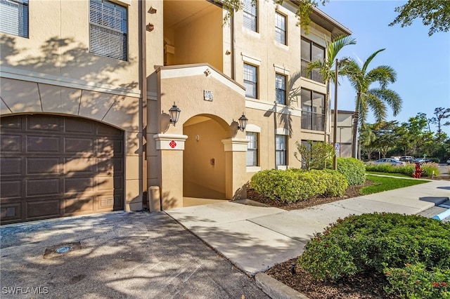 view of front of house with a garage