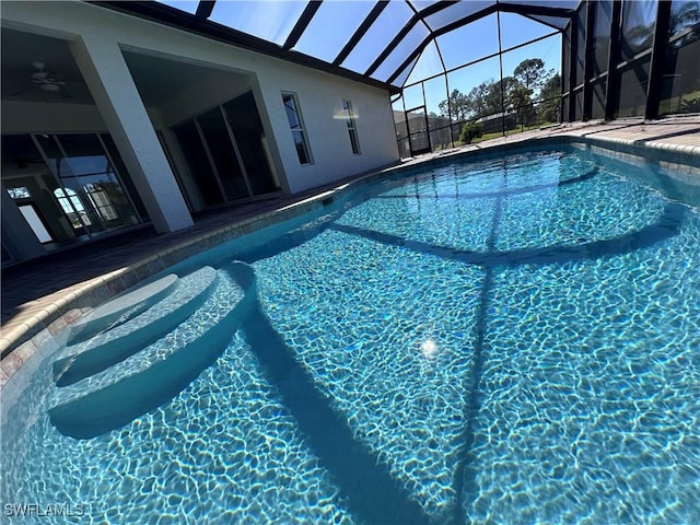 view of pool featuring a lanai