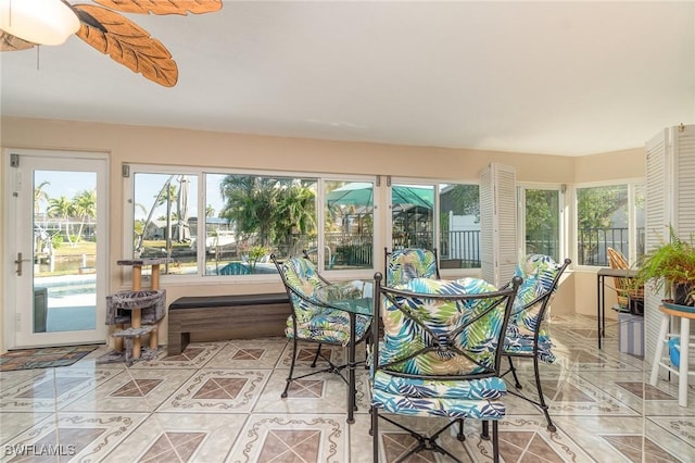 sunroom / solarium featuring plenty of natural light