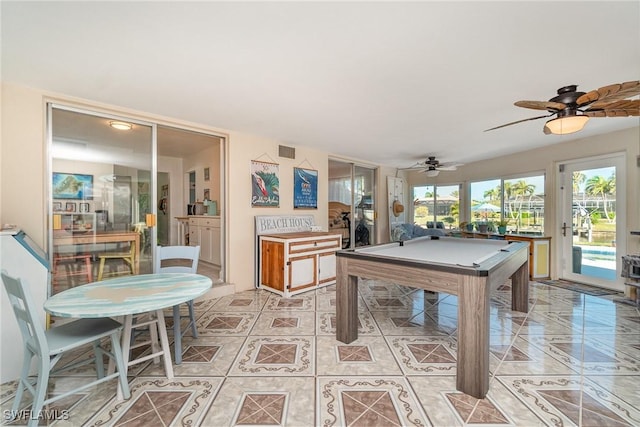 rec room with light tile patterned flooring, billiards, and ceiling fan