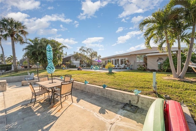 view of patio / terrace featuring a pool