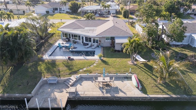 drone / aerial view with a water view