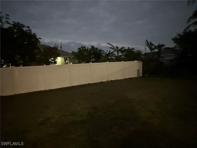 view of yard with fence