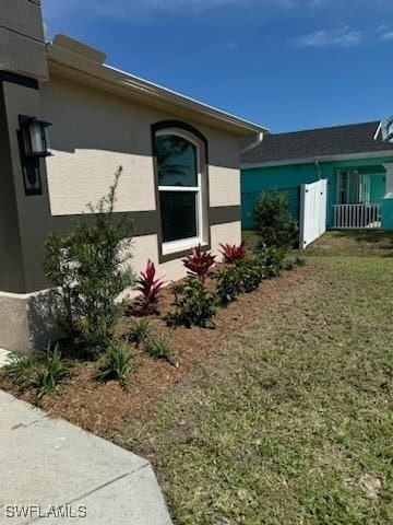 exterior space with stucco siding