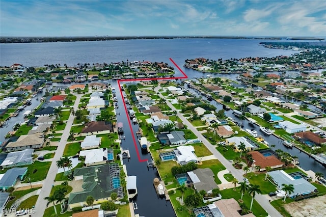 bird's eye view with a water view