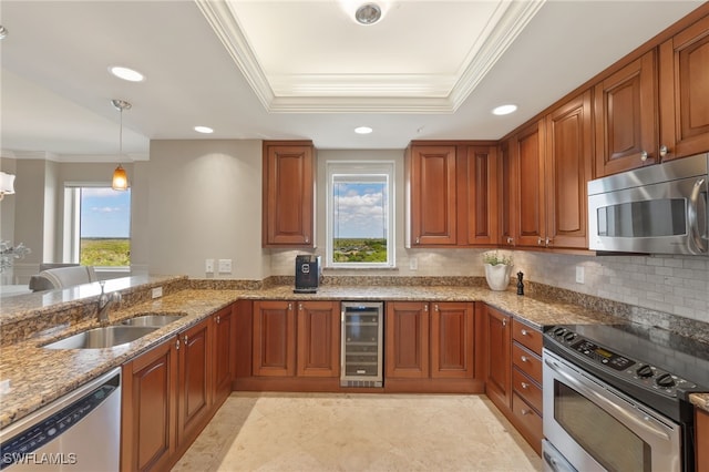 kitchen with sink, light stone counters, ornamental molding, stainless steel appliances, and beverage cooler