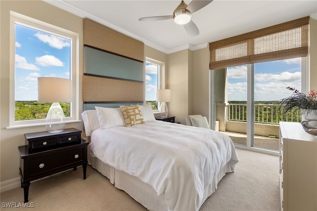 carpeted bedroom with access to exterior, ornamental molding, and ceiling fan