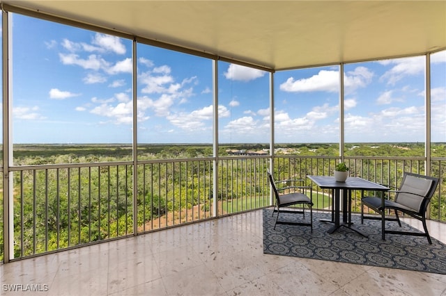 unfurnished sunroom featuring a healthy amount of sunlight