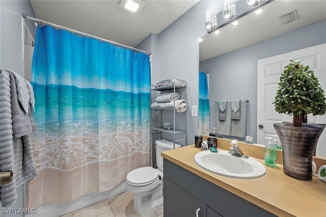 full bathroom featuring shower / bath combination with curtain, vanity, toilet, and tile patterned floors