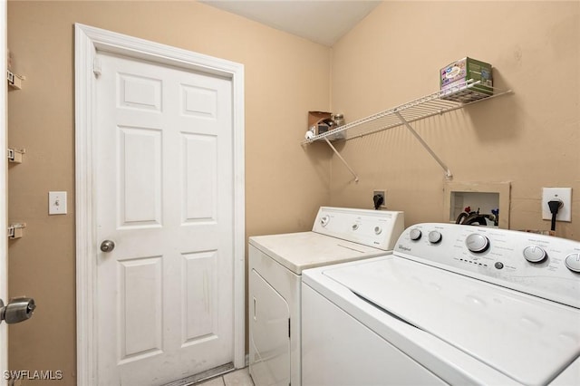 washroom with separate washer and dryer