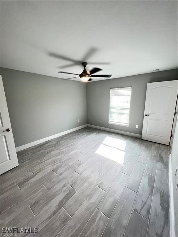 spare room featuring ceiling fan