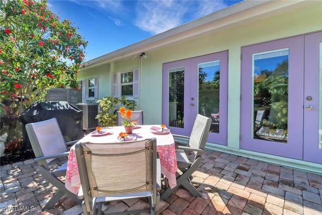 view of patio with central AC unit