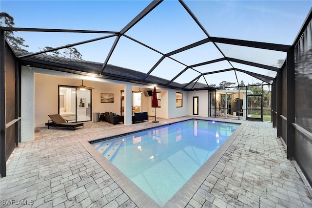 2330 6th Ave NE, Naples, FL 34120 - view of pool with ceiling fan, an outdoor living space, a lanai, and a patio