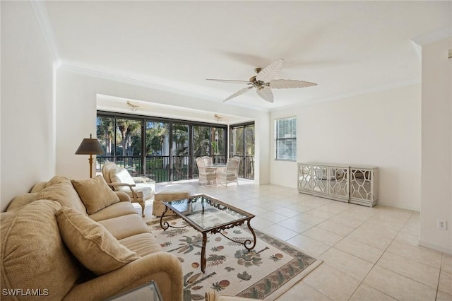 tiled living room featuring ornamental molding and ceiling fan