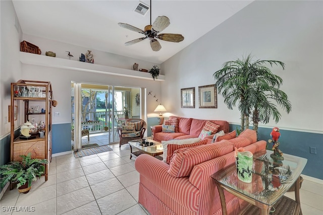 tiled living room with ceiling fan