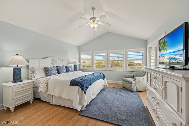 bedroom with lofted ceiling, light hardwood / wood-style flooring, and ceiling fan