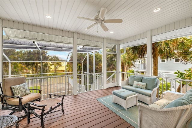 sunroom / solarium with ceiling fan