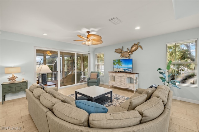 living room featuring ceiling fan