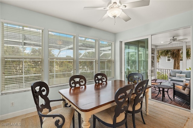 dining space featuring ceiling fan