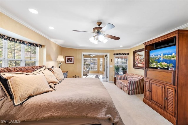 bedroom featuring ornamental molding, light carpet, and multiple windows