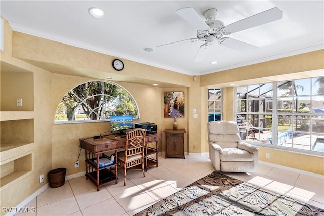 home office with baseboards, a wealth of natural light, and light tile patterned flooring