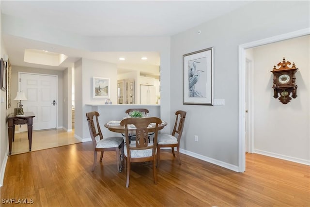 dining area with light wood-type flooring