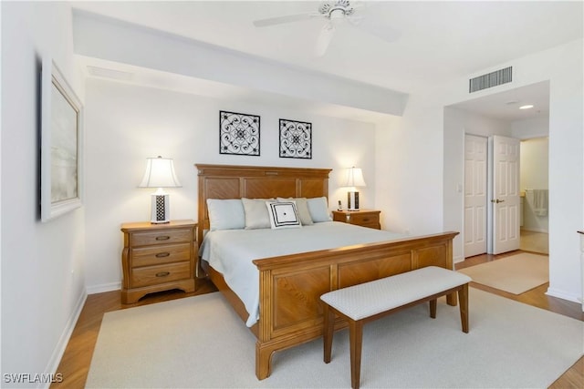 bedroom with ceiling fan and light wood-type flooring