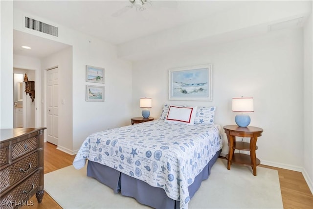 bedroom featuring hardwood / wood-style floors