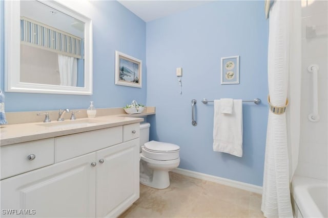 full bathroom featuring vanity, toilet, tile patterned floors, and shower / bath combo with shower curtain