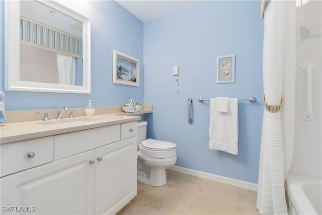 1001 Arbor Lake Dr Unit 1202, Naples, FL 34110 - full bath featuring toilet, vanity, and baseboards