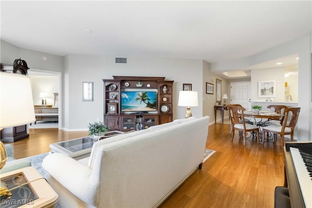 living room with hardwood / wood-style floors